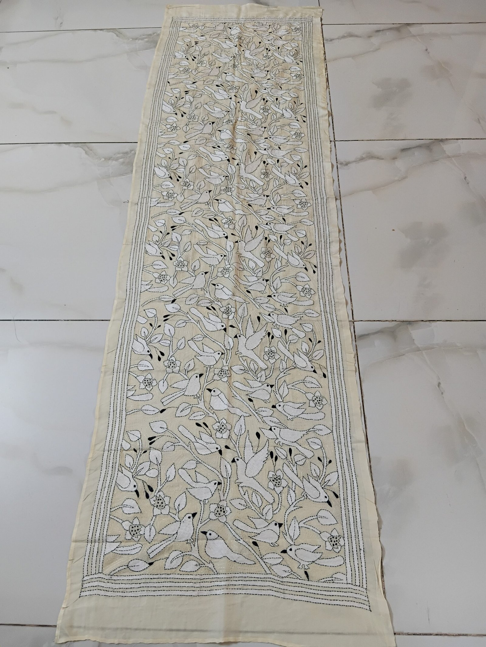 Silk Kantha Stitch Stole or Scarf % Handmade Kantha stitch stole featuring intricate hand embroidery with colorful traditional motifs on soft fabric. This elegant Bengal Kantha stole showcases detailed running-stitch artwork, ethnic craftsmanship, and a beautiful handcrafted texture, making it ideal for Indian ethnic wear, festive occasions, casual styling, gifting, and sustainable handmade fashion.