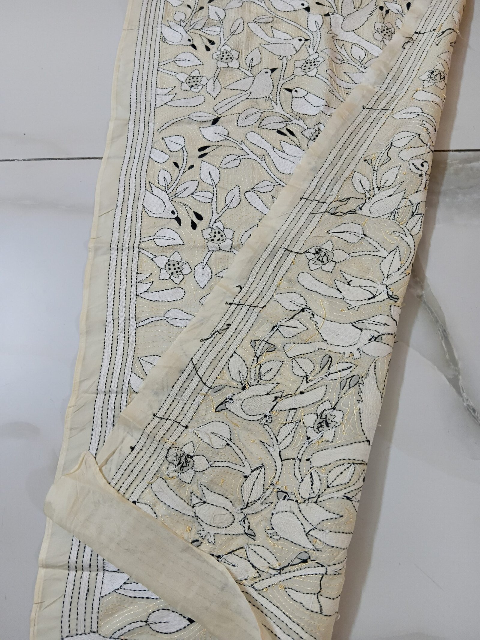 Silk Kantha Stitch Stole or Scarf % Handmade Kantha stitch stole featuring intricate hand embroidery with colorful traditional motifs on soft fabric. This elegant Bengal Kantha stole showcases detailed running-stitch artwork, ethnic craftsmanship, and a beautiful handcrafted texture, making it ideal for Indian ethnic wear, festive occasions, casual styling, gifting, and sustainable handmade fashion.