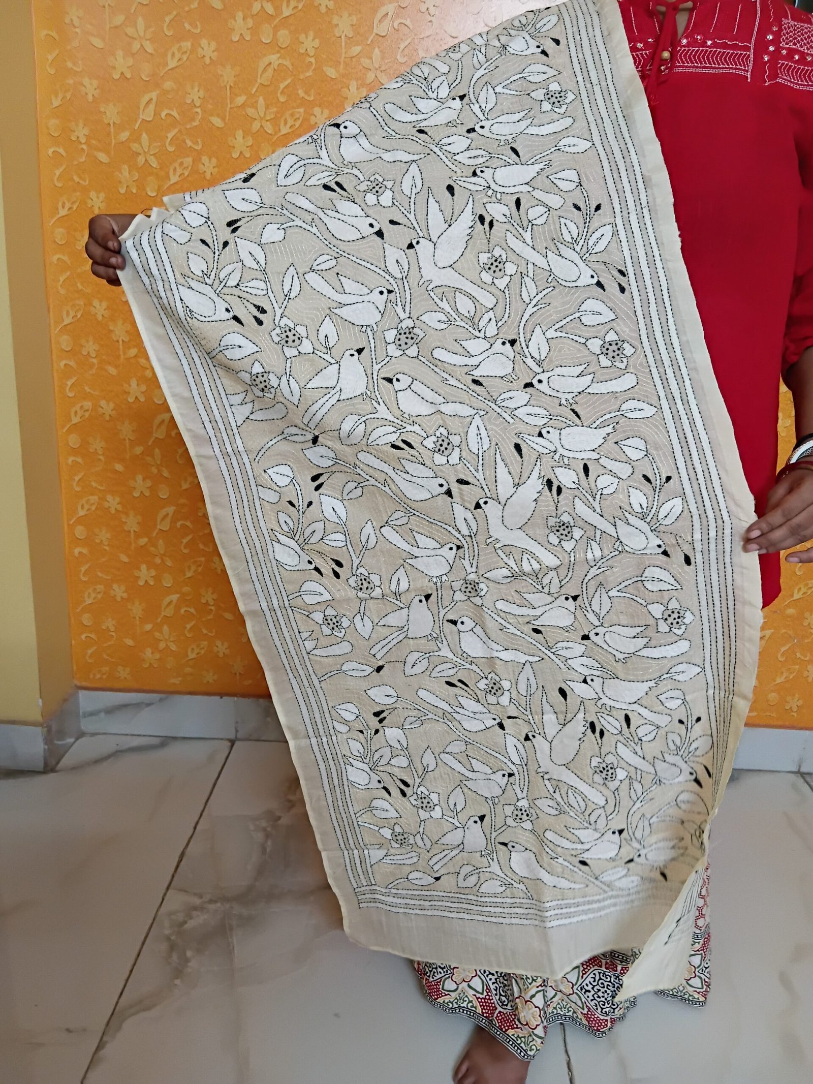 Handmade Kantha stitch stole featuring intricate hand embroidery with colorful traditional motifs on soft fabric. This elegant Bengal Kantha stole showcases detailed running-stitch artwork, ethnic craftsmanship, and a beautiful handcrafted texture, making it ideal for Indian ethnic wear, festive occasions, casual styling, gifting, and sustainable handmade fashion.