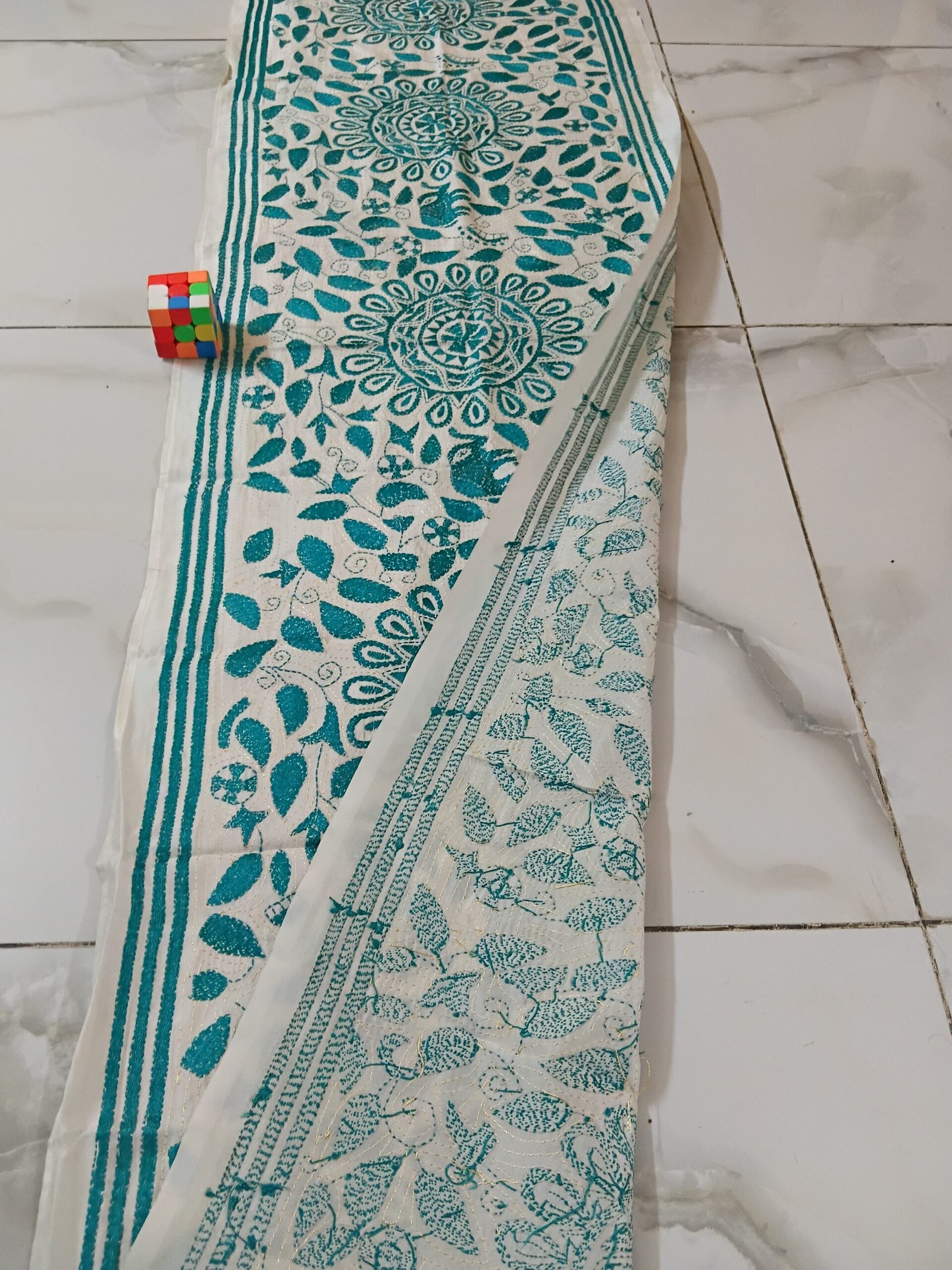 Silk Kantha Stitch Stole or Scarf % Handmade Kantha stitch stole featuring intricate hand embroidery with colorful traditional motifs on soft fabric. This elegant Bengal Kantha stole showcases detailed running-stitch artwork, ethnic craftsmanship, and a beautiful handcrafted texture, making it ideal for Indian ethnic wear, festive occasions, casual styling, gifting, and sustainable handmade fashion.