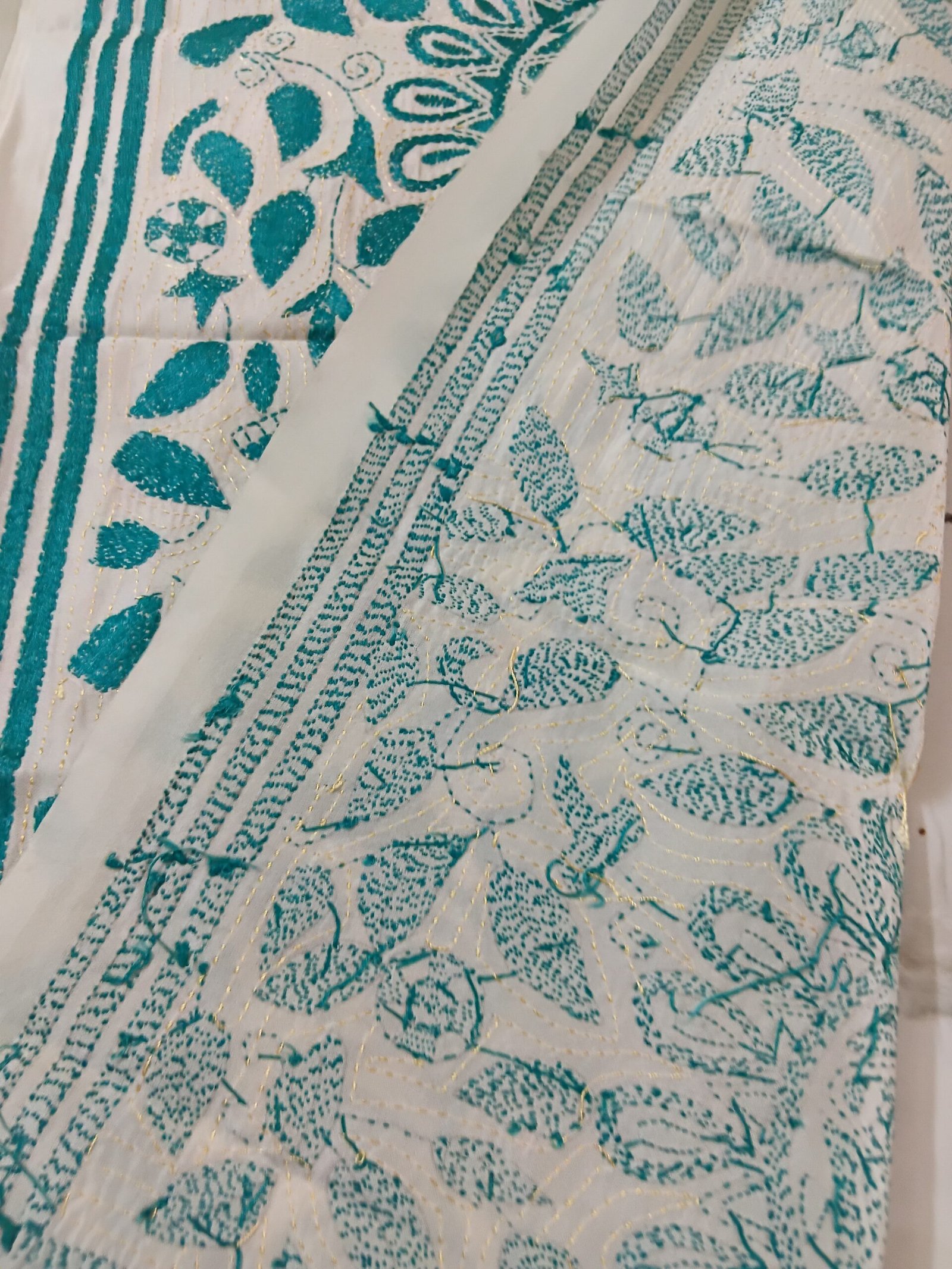 Silk Kantha Stitch Stole or Scarf % Handmade Kantha stitch stole featuring intricate hand embroidery with colorful traditional motifs on soft fabric. This elegant Bengal Kantha stole showcases detailed running-stitch artwork, ethnic craftsmanship, and a beautiful handcrafted texture, making it ideal for Indian ethnic wear, festive occasions, casual styling, gifting, and sustainable handmade fashion.
