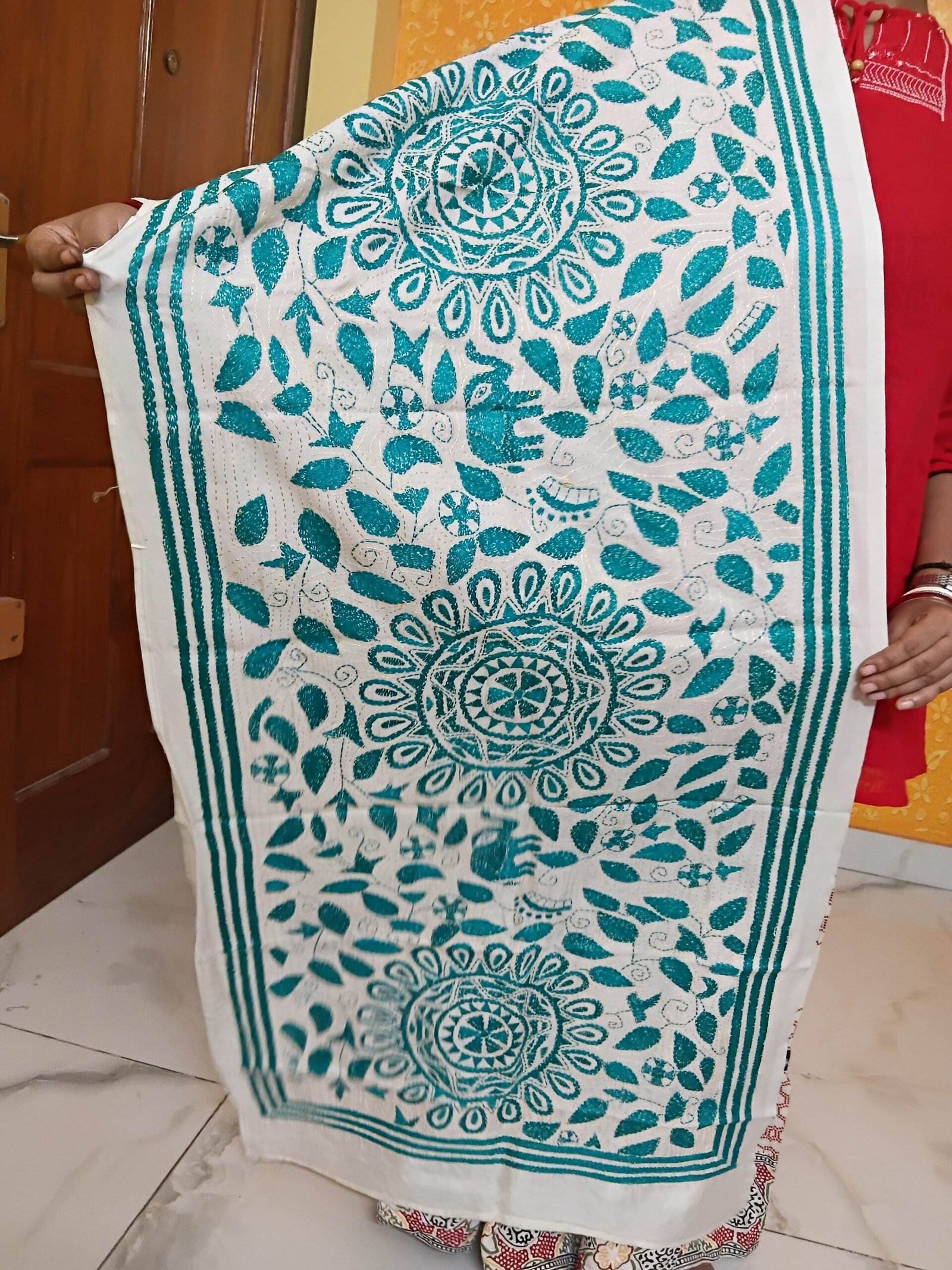 Handmade Kantha stitch stole featuring intricate hand embroidery with colorful traditional motifs on soft fabric. This elegant Bengal Kantha stole showcases detailed running-stitch artwork, ethnic craftsmanship, and a beautiful handcrafted texture, making it ideal for Indian ethnic wear, festive occasions, casual styling, gifting, and sustainable handmade fashion.
