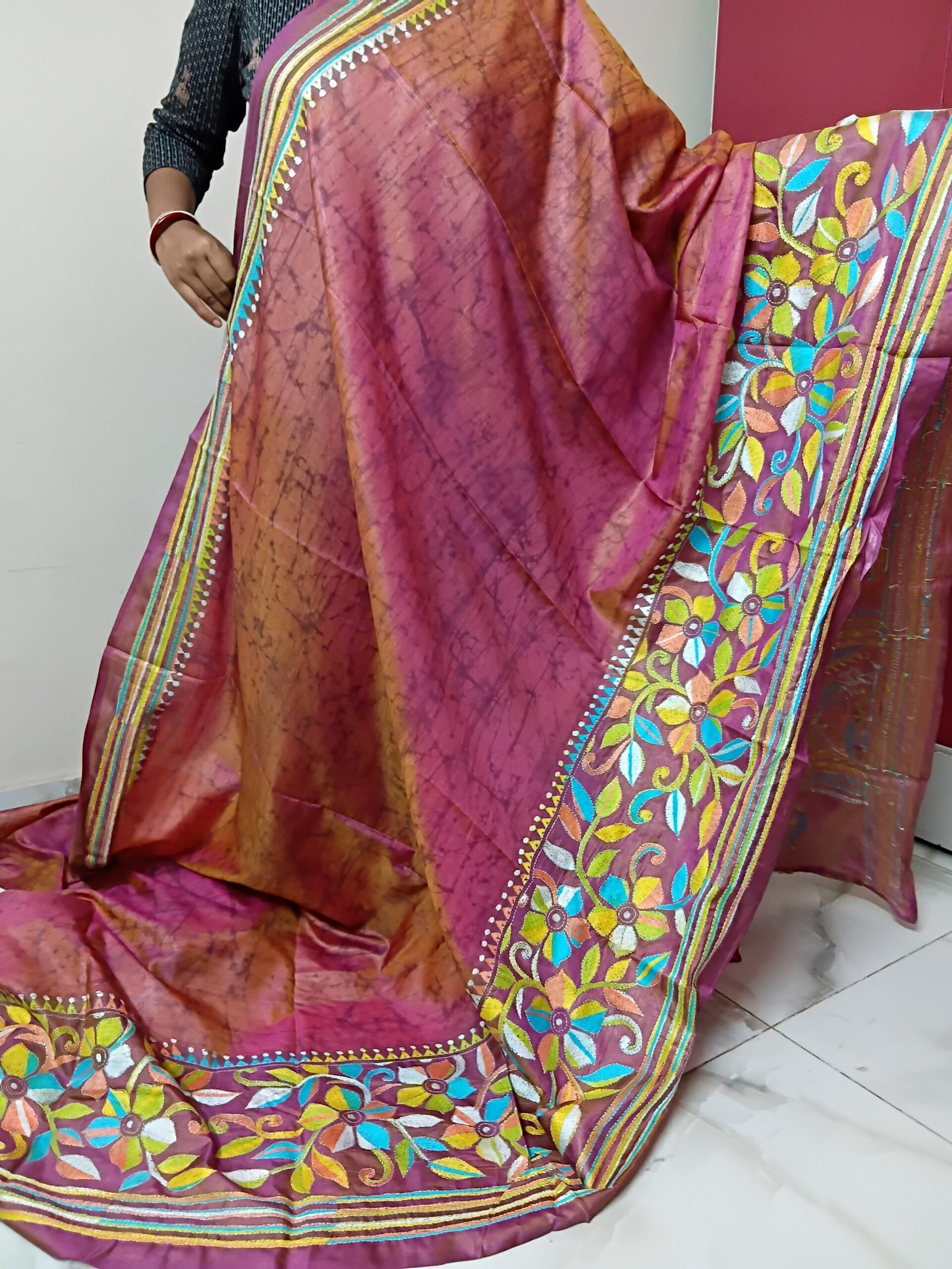 Batik Silk Kantha Stitch Saree % Handmade wax batik blended Bangalore silk Kantha stitch saree featuring beautiful batik patterns combined with intricate hand embroidery and traditional Bengal Kantha stitch work. This elegant Indian saree showcases rich textures, artistic motifs, handcrafted detailing, and traditional craftsmanship, making it perfect for festive occasions, weddings, ethnic wear, special events, and gifting.