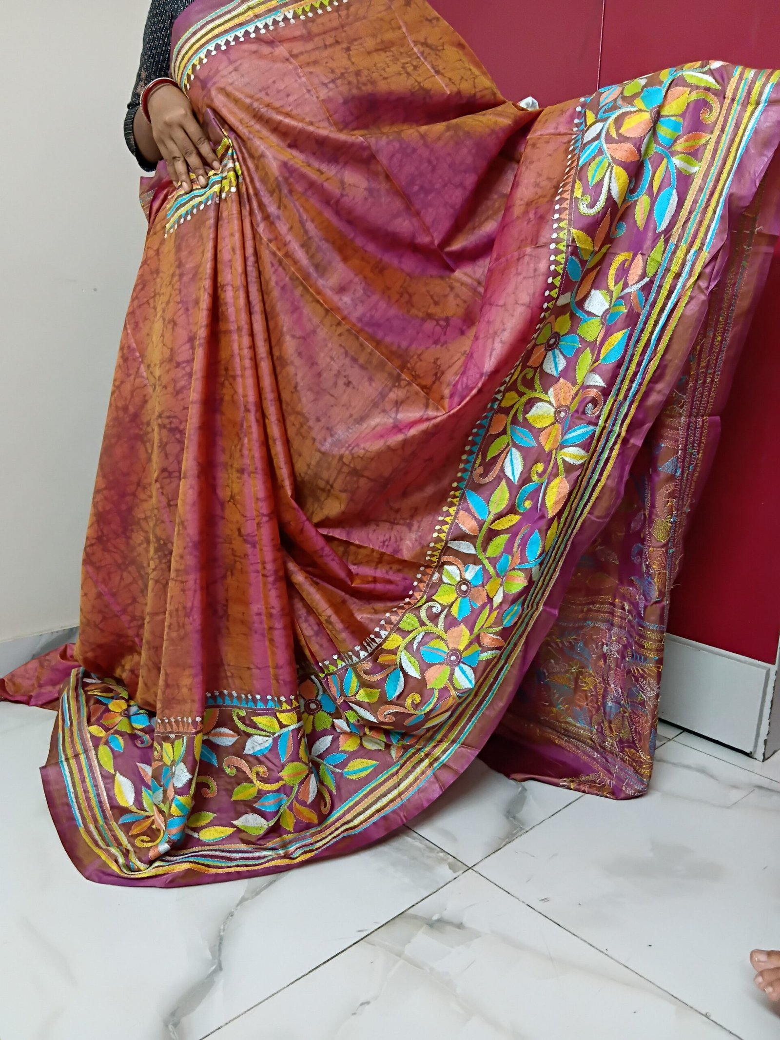 Batik Silk Kantha Stitch Saree % Handmade wax batik blended Bangalore silk Kantha stitch saree featuring beautiful batik patterns combined with intricate hand embroidery and traditional Bengal Kantha stitch work. This elegant Indian saree showcases rich textures, artistic motifs, handcrafted detailing, and traditional craftsmanship, making it perfect for festive occasions, weddings, ethnic wear, special events, and gifting.