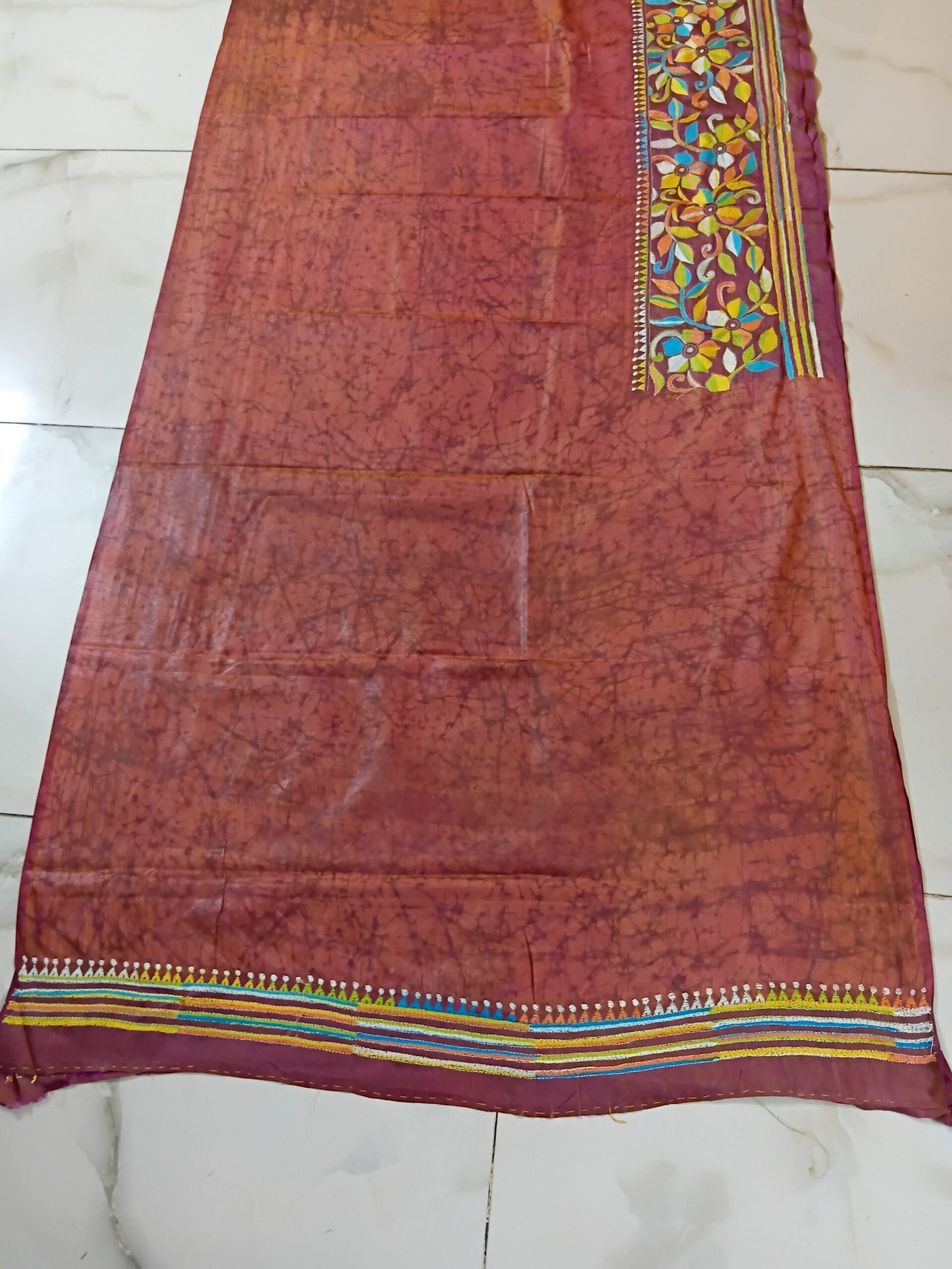 Batik Silk Kantha Stitch Saree % Handmade wax batik blended Bangalore silk Kantha stitch saree featuring beautiful batik patterns combined with intricate hand embroidery and traditional Bengal Kantha stitch work. This elegant Indian saree showcases rich textures, artistic motifs, handcrafted detailing, and traditional craftsmanship, making it perfect for festive occasions, weddings, ethnic wear, special events, and gifting.