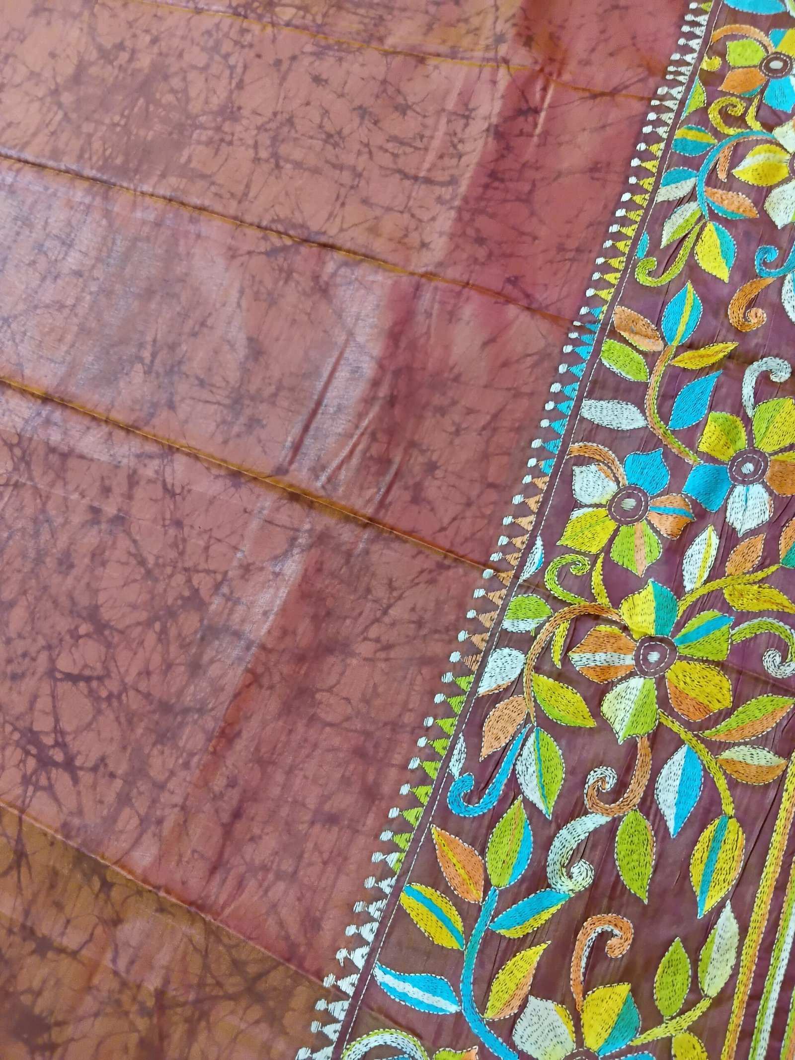 Batik Silk Kantha Stitch Saree % Handmade wax batik blended Bangalore silk Kantha stitch saree featuring beautiful batik patterns combined with intricate hand embroidery and traditional Bengal Kantha stitch work. This elegant Indian saree showcases rich textures, artistic motifs, handcrafted detailing, and traditional craftsmanship, making it perfect for festive occasions, weddings, ethnic wear, special events, and gifting.
