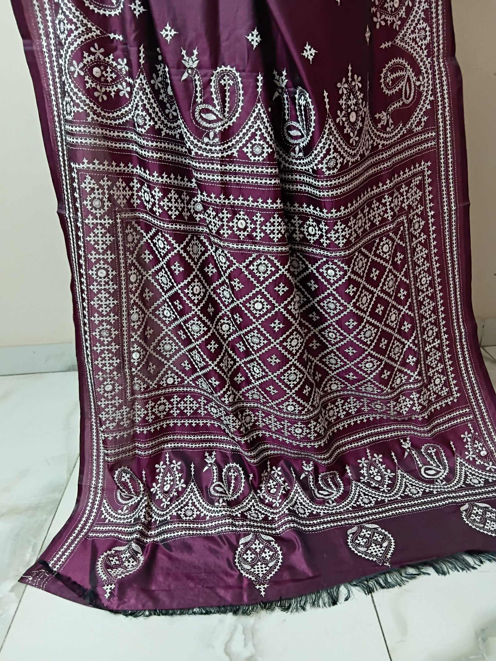 Maroon Silk Gujarati Stitch Saree % Maroon Silk Kantha Stitch Saree. Handmade Kantha stitch blended Bangalore silk saree featuring intricate hand embroidery and traditional Bengal Kantha motifs. This elegant Indian saree showcases detailed running stitch work, rich texture, and artisanal craftsmanship, making it ideal for festive occasions, weddings, ethnic wear, special events, and gifting.