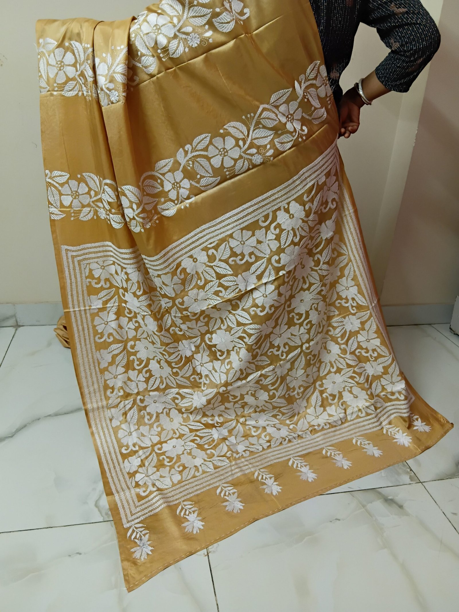 Beige Silk Kantha Stitch Saree. Handmade Kantha stitch blended Bangalore silk saree featuring intricate hand embroidery and traditional Bengal Kantha motifs. This elegant Indian saree showcases detailed running stitch work, rich texture, and artisanal craftsmanship, making it ideal for festive occasions, weddings, ethnic wear, special events, and gifting.