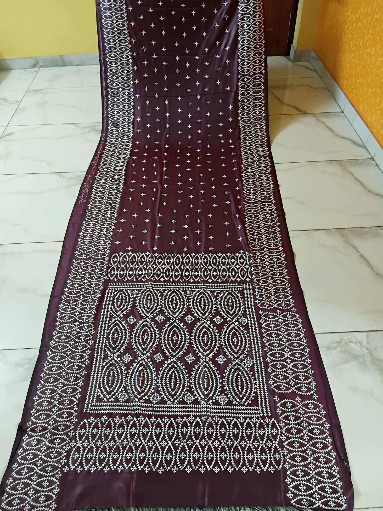 Maroon Silk Gujarati Stitch Saree % Maroon Silk Kantha Stitch Saree. Handmade Kantha stitch blended Bangalore silk saree featuring intricate hand embroidery and traditional Bengal Kantha motifs. This elegant Indian saree showcases detailed running stitch work, rich texture, and artisanal craftsmanship, making it ideal for festive occasions, weddings, ethnic wear, special events, and gifting.