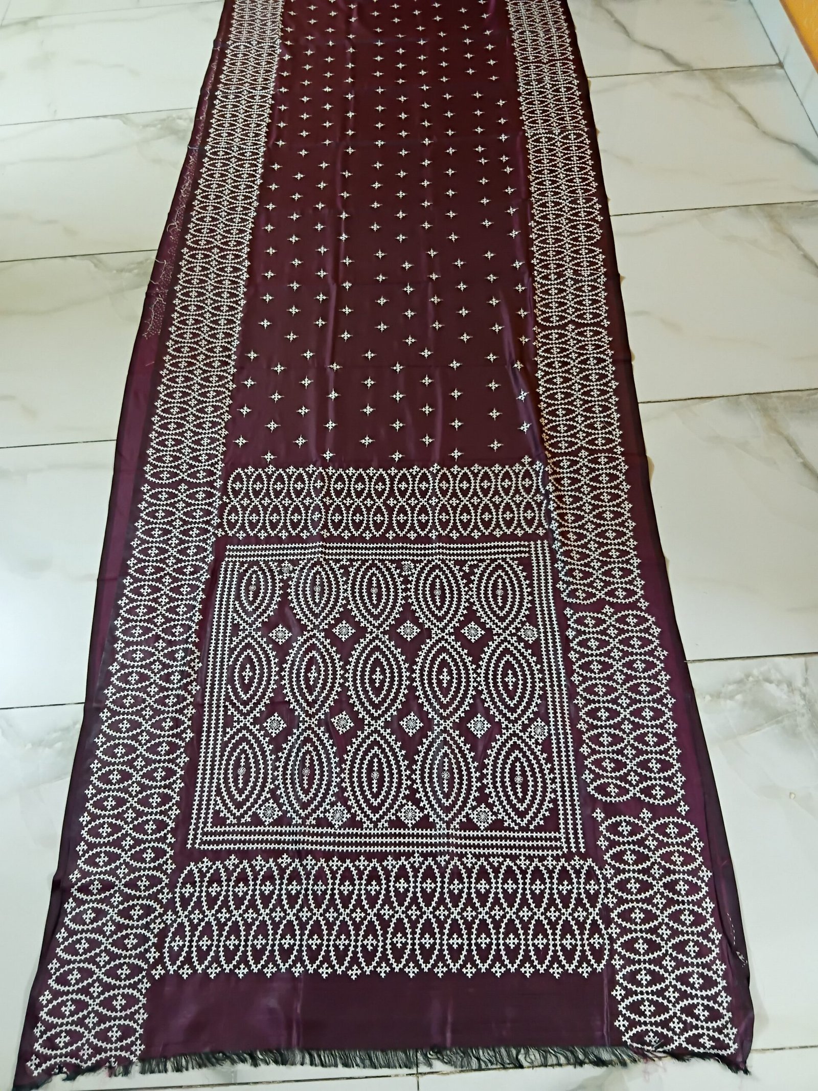 Maroon Silk Gujarati Stitch Saree % Maroon Silk Kantha Stitch Saree. Handmade Kantha stitch blended Bangalore silk saree featuring intricate hand embroidery and traditional Bengal Kantha motifs. This elegant Indian saree showcases detailed running stitch work, rich texture, and artisanal craftsmanship, making it ideal for festive occasions, weddings, ethnic wear, special events, and gifting.