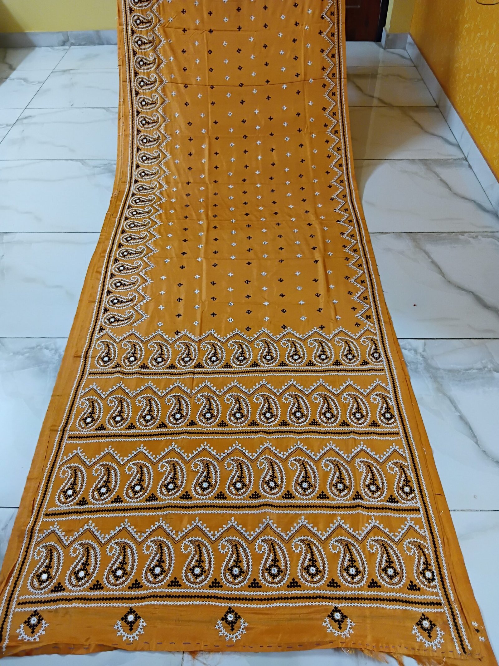 Orange Kalka Motif Gujarati Stitch Saree – Blended Bangalore Silk % Orange Kalka motif Gujarati Stitch saree in blended Bangalore silk