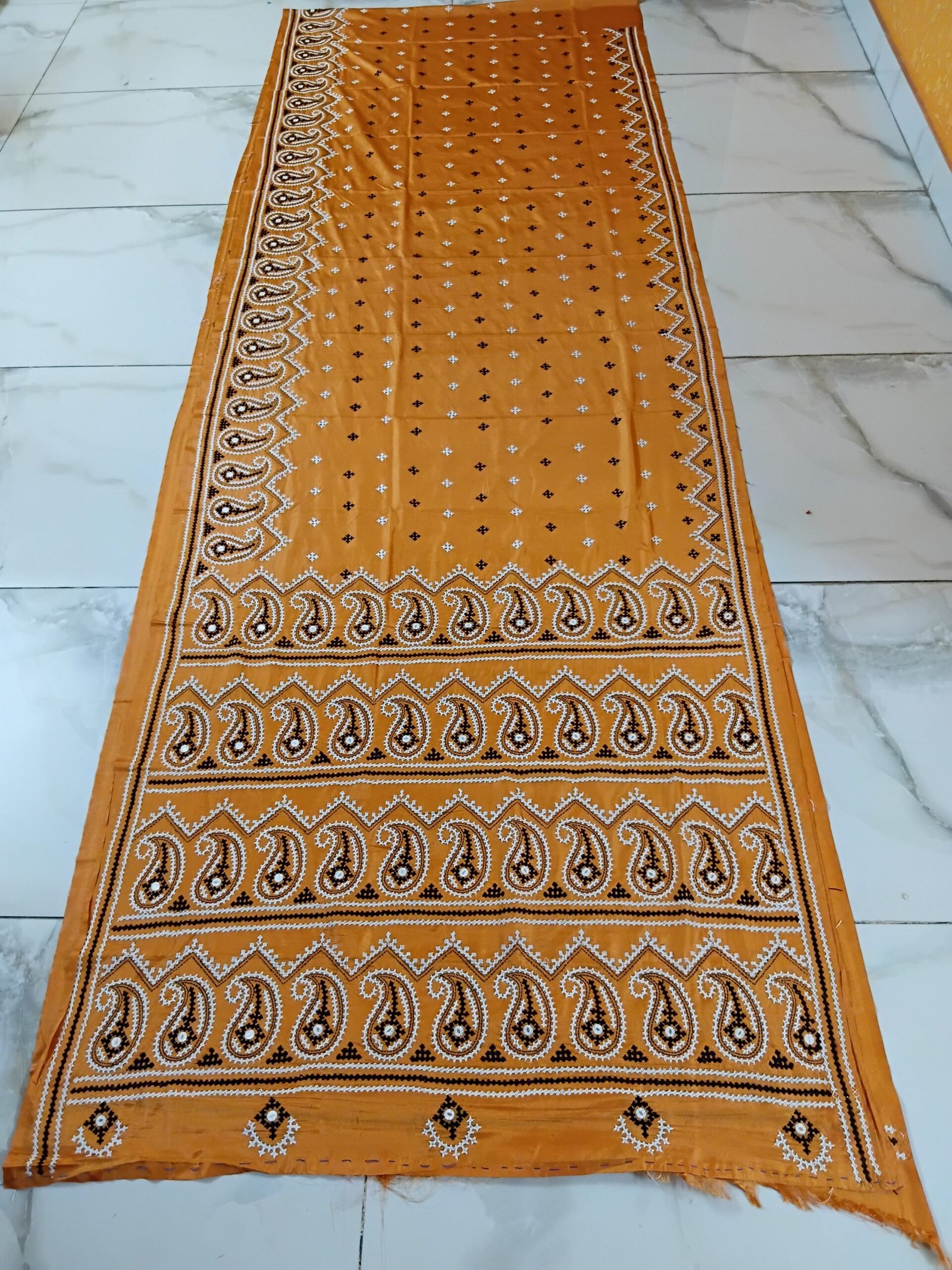 Orange Kalka Motif Gujarati Stitch Saree – Blended Bangalore Silk % Detailed Kalka motif embroidery on an orange Gujarati Stitch saree