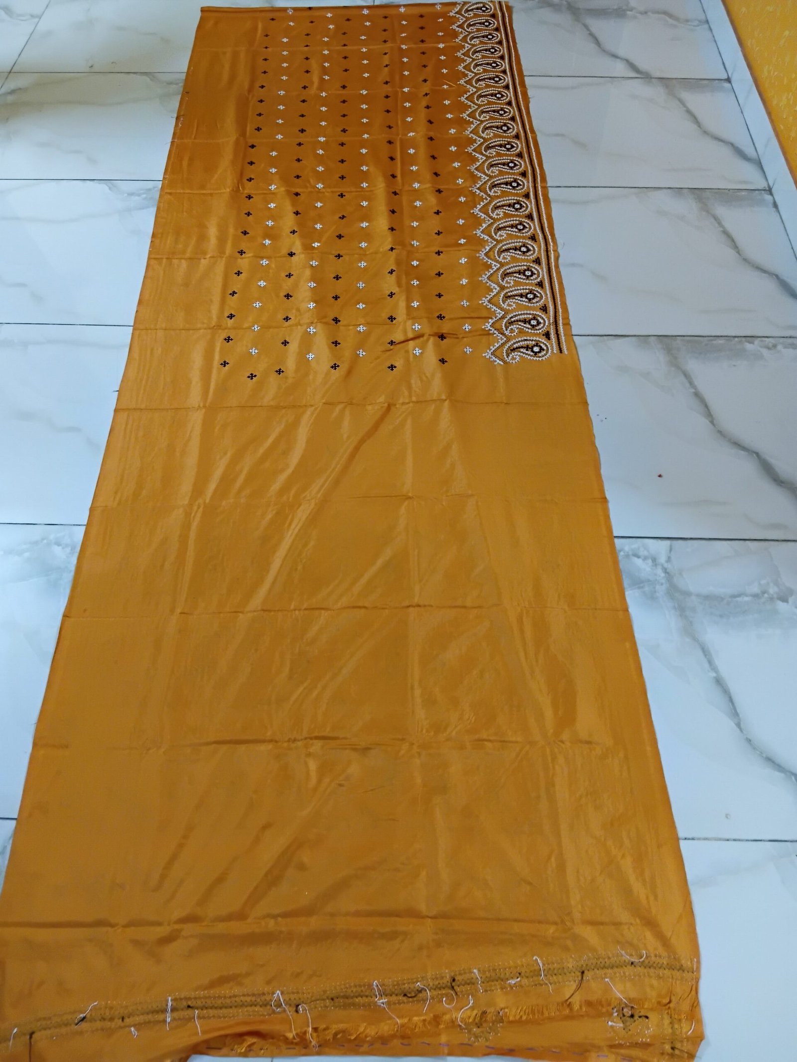 Orange Kalka Motif Gujarati Stitch Saree – Blended Bangalore Silk % Blended Bangalore silk fabric detail of orange Gujarati Stitch saree