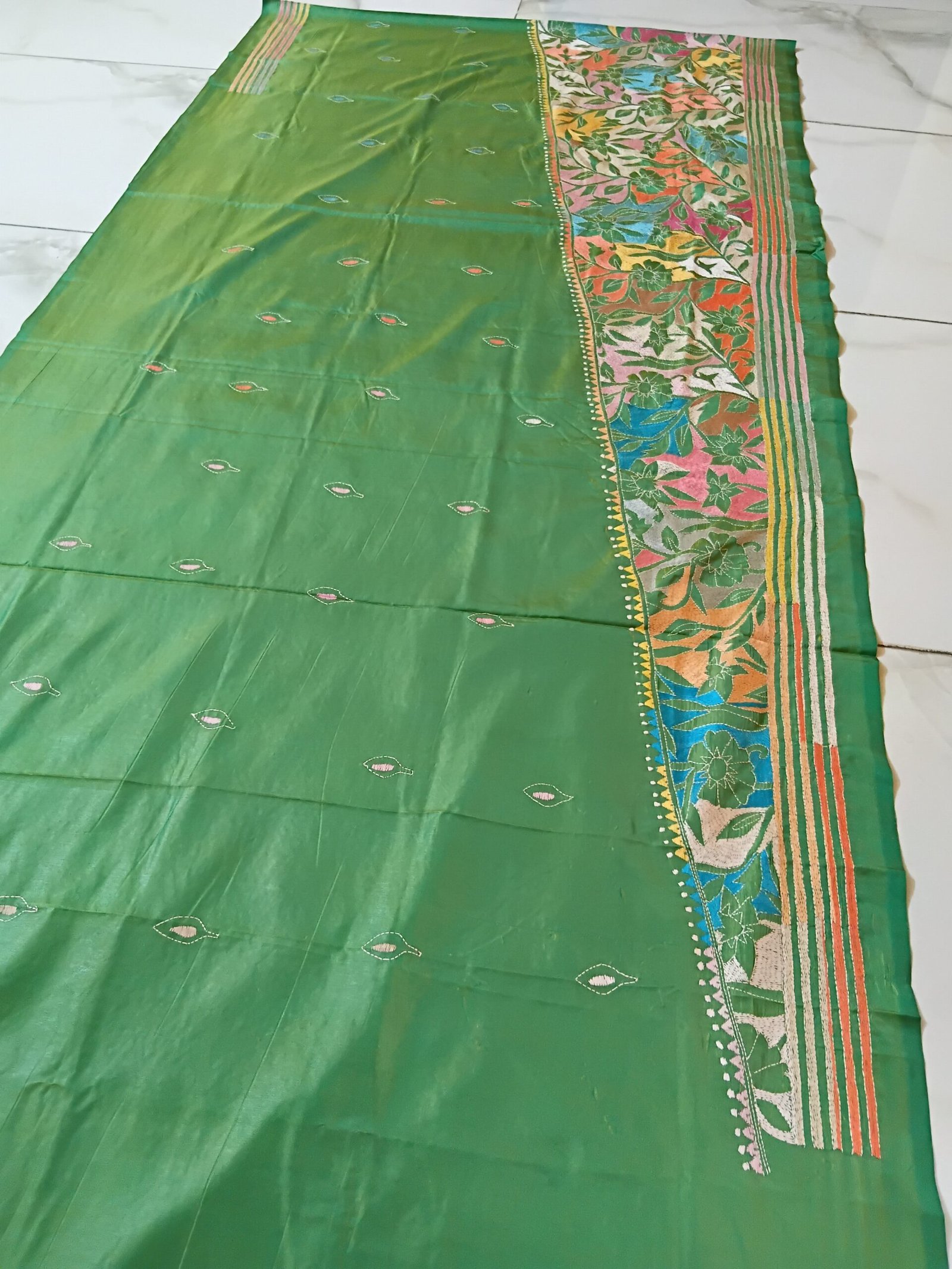 Light Green Floral Motif Kantha Stitch Saree on Blended Bangalore Silk % Light green Kantha stitch sari with traditional floral patterns