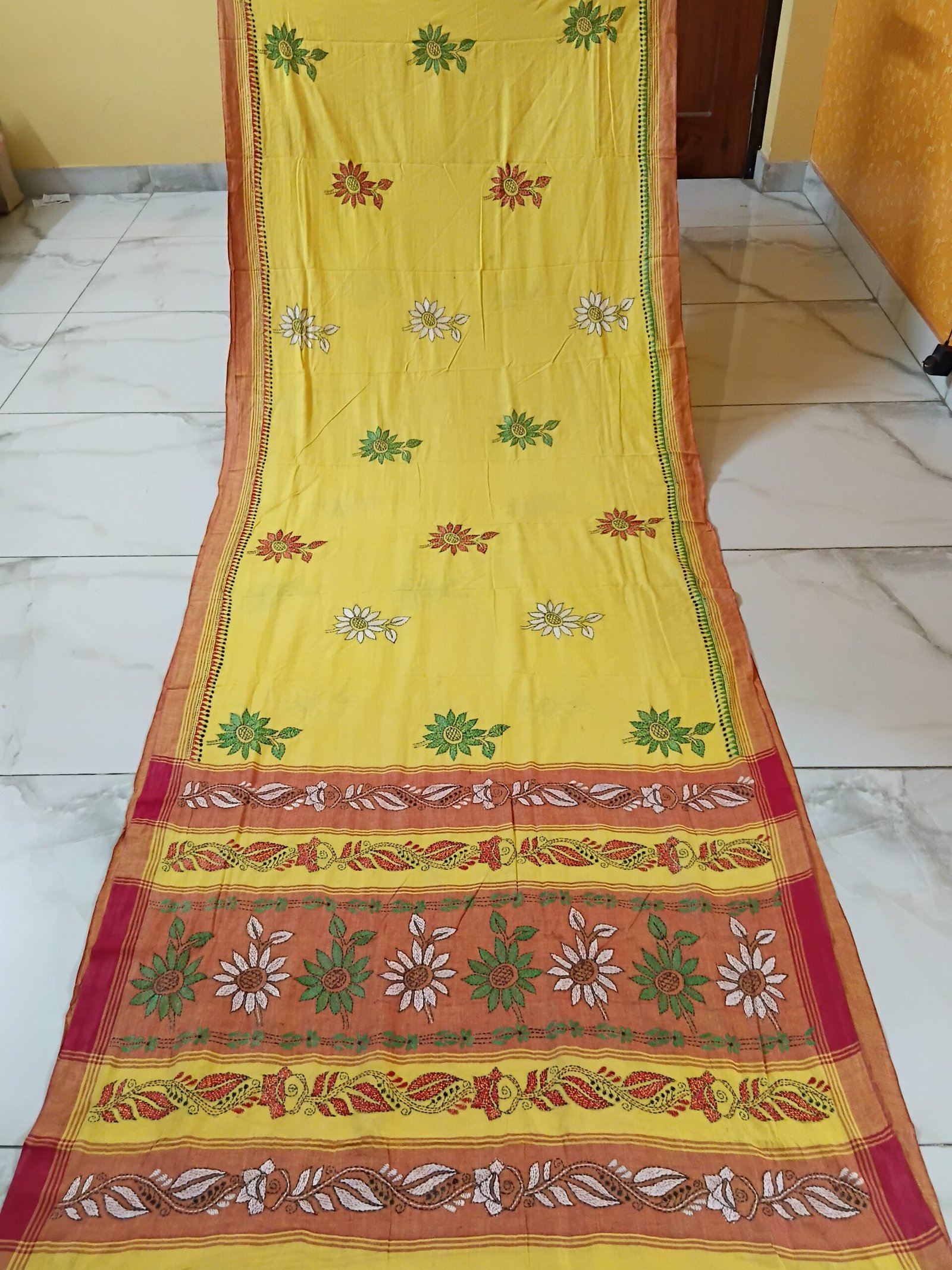Yellow Cotton Kantha Stitch Saree % Yellow cotton saree featuring handcrafted Kantha stitch patterns